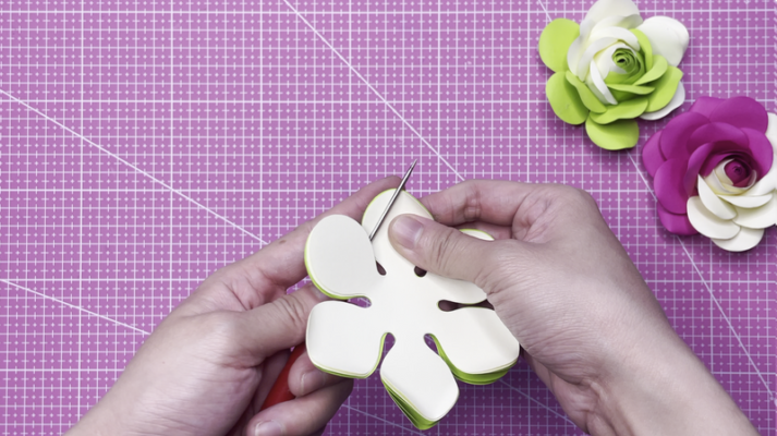 Utilize the petal claw tool to begin the process